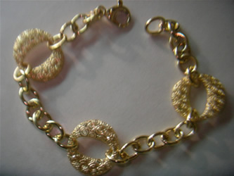 pulseras finas de oro y plata