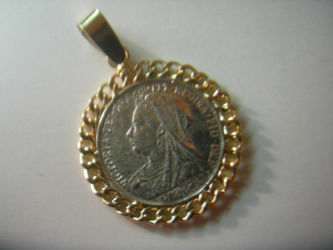 colgante moneda