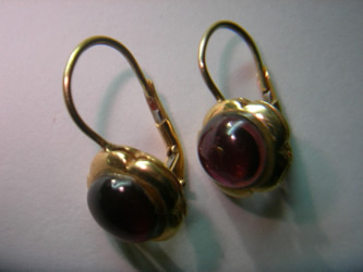 pendientes flor granate