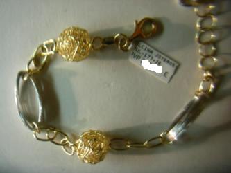 pulseras finas de oro y plata